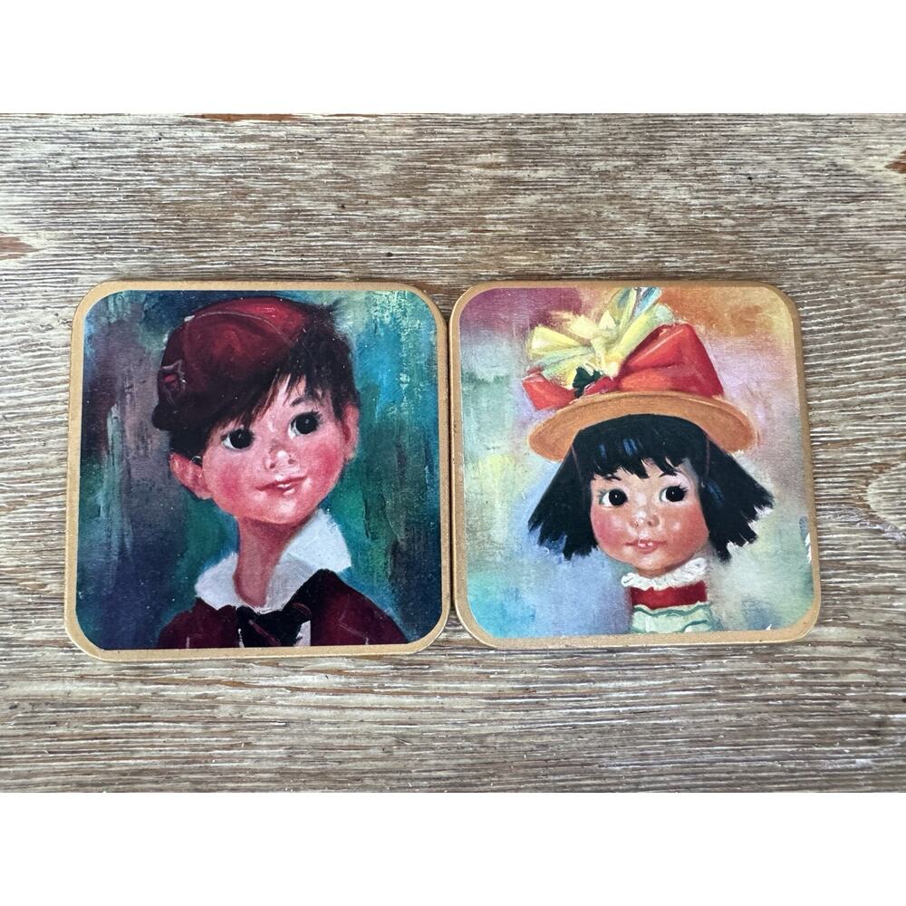 Set Of 2 VINTAGE BIG EYED CHILDREN WIN El WARE TRIVETS/ COASTERS